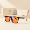 Ember black square blue light glasses with orange lenses beside the Auresta gift box, cloth and hard case