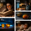Hazel blue light glasses shown in five scenes — reading in bed, at a desk in the evening, close-up of the orange lenses, in front of a monitor, and relaxing on a sofa